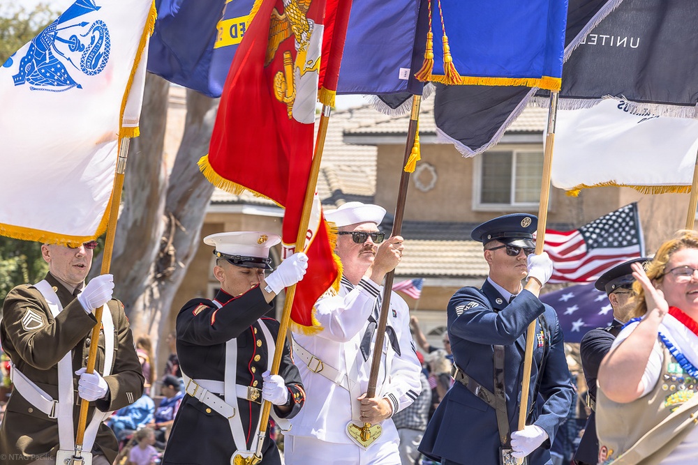 RECRUITERS ASSIGNED TO NAVY TALENT ACQUISITION GROUP PACIFIC PARTICIPATE IN THE ARMED FORCES DAY PARADE IN TORRANCE, CALIFORNIA.