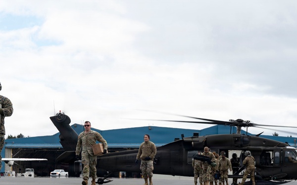 Joint-Service Members Unload Personnel and Supplies Following Village Outreach Missions During Kodiak Arctic Care 2026