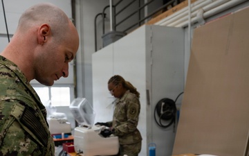 Joint-service members fabricate glasses for the community of Kodiak Island during Kodiak Arctic Care 2026