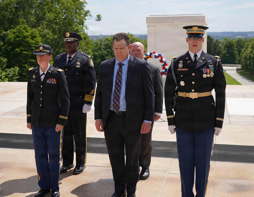 Members of law enforcement from Joint Base Myer-Henderson Hall lay wreath at Tomb of The Unknown Soldier