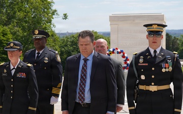 Members of law enforcement from Joint Base Myer-Henderson Hall lay wreath at Tomb of The Unknown Soldier