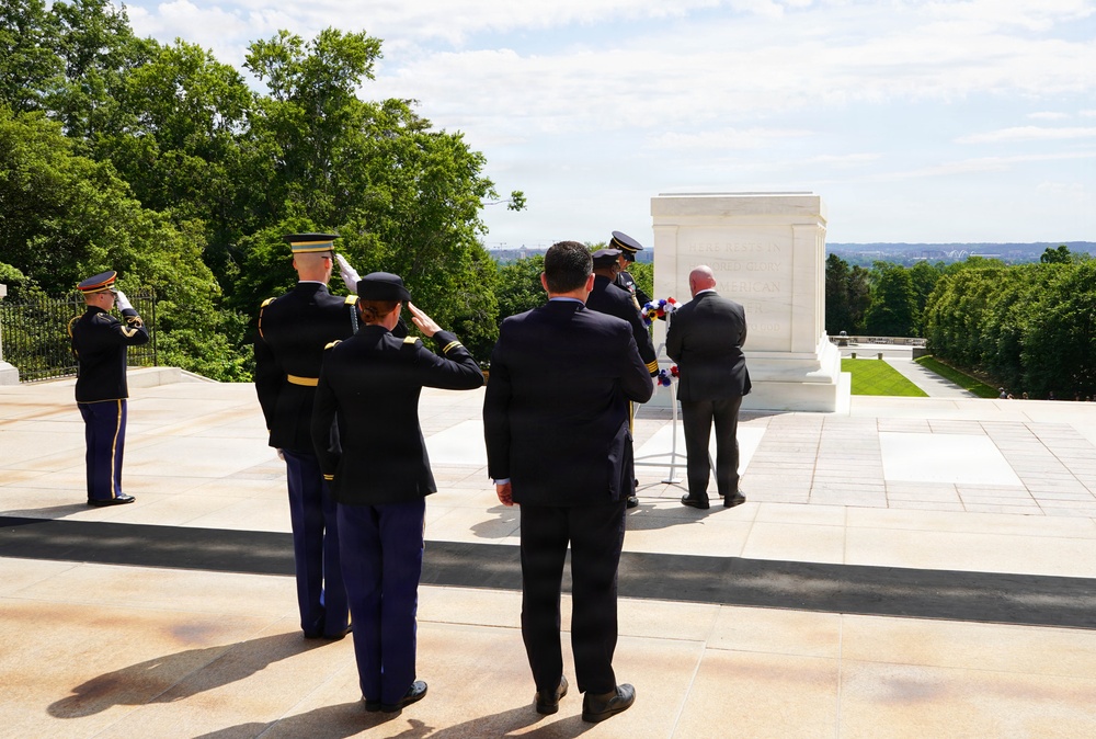 Members of law enforcement from Joint Base Myer-Henderson Hall lay wreath at Tomb of The Unknown Soldier