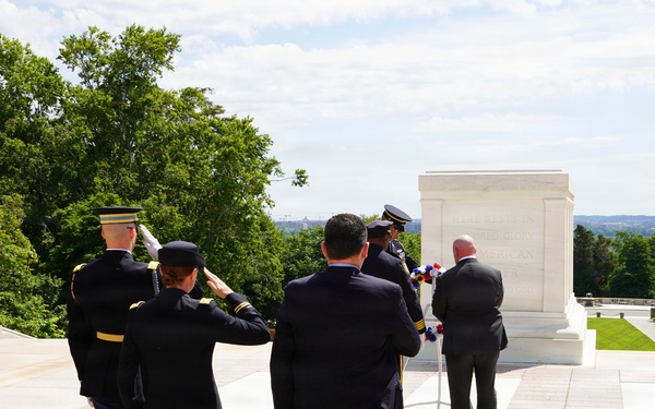 Members of law enforcement from Joint Base Myer-Henderson Hall lay wreath at Tomb of The Unknown Soldier