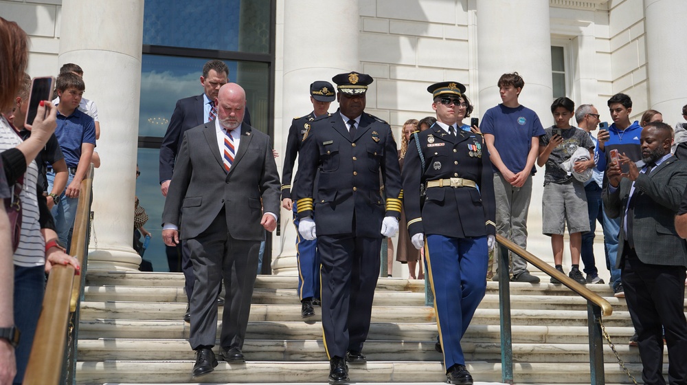 Members of law enforcement from Joint Base Myer-Henderson Hall lay wreath at Tomb of The Unknown Soldier