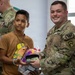 U.S. Service Members are joined by the U.S. Ambassador and First Lady at an Optometry Giveaway in Panama City
