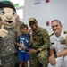 U.S. Service Members are joined by the U.S. Ambassador and First Lady at an Optometry Giveaway in Panama City
