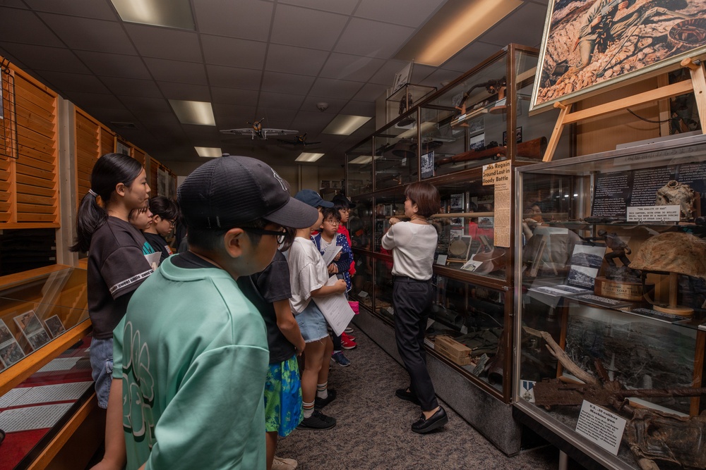 Local Okinawa Elementary students visit the Battle of Okinawa Museum aboard Camp Kinser