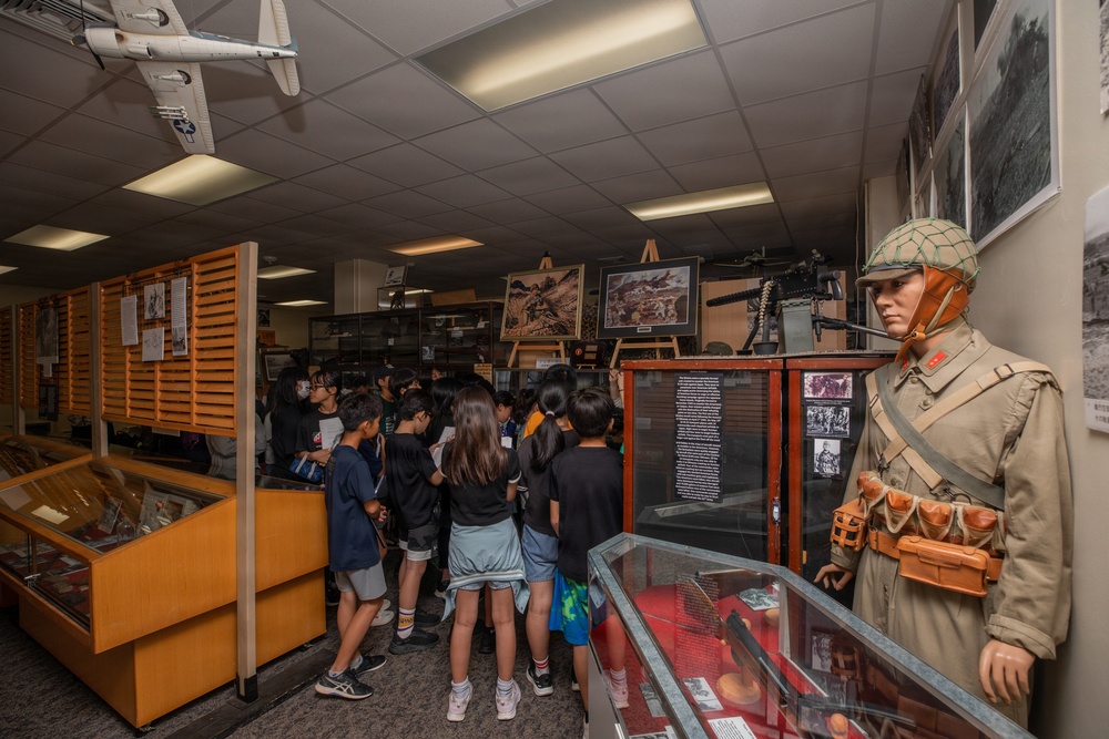 Local Okinawa Elementary students visit the Battle of Okinawa Museum aboard Camp Kinser