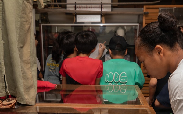 Local Okinawa Elementary students visit the Battle of Okinawa Museum aboard Camp Kinser