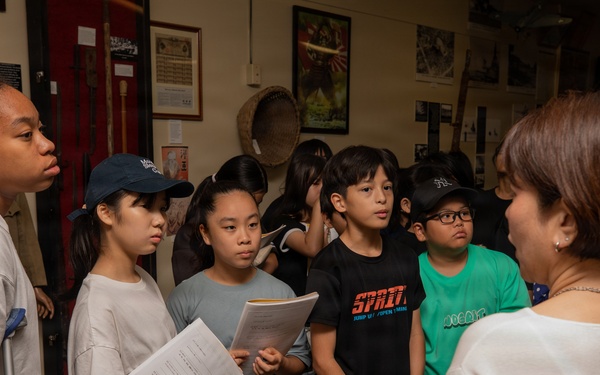 Local Okinawa Elementary students visit the Battle of Okinawa Museum aboard Camp Kinser