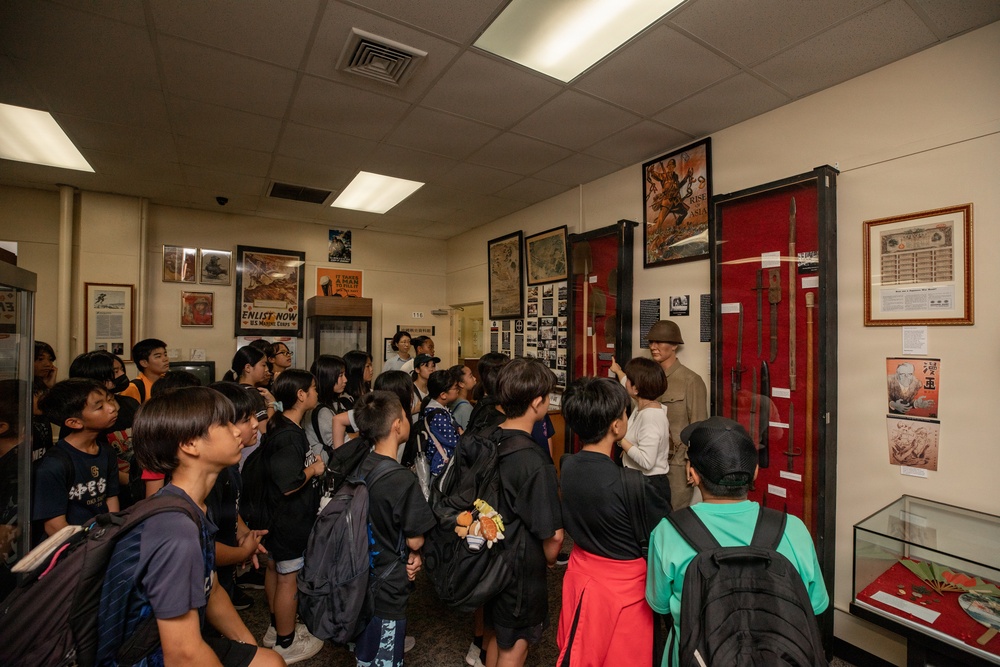 Local Okinawa Elementary students visit the Battle of Okinawa Museum aboard Camp Kinser