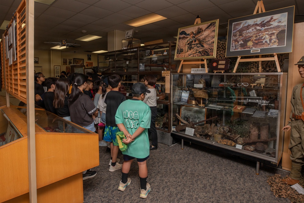 Local Okinawa Elementary students visit the Battle of Okinawa Museum aboard Camp Kinser