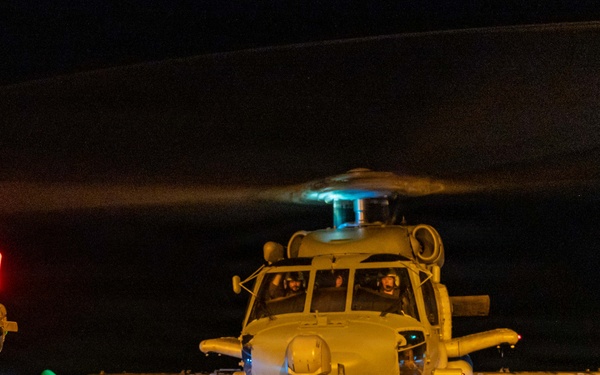 USS Mustin conducts night flight operations
