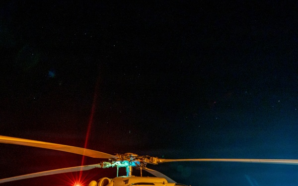 USS Mustin conducts night flight operations