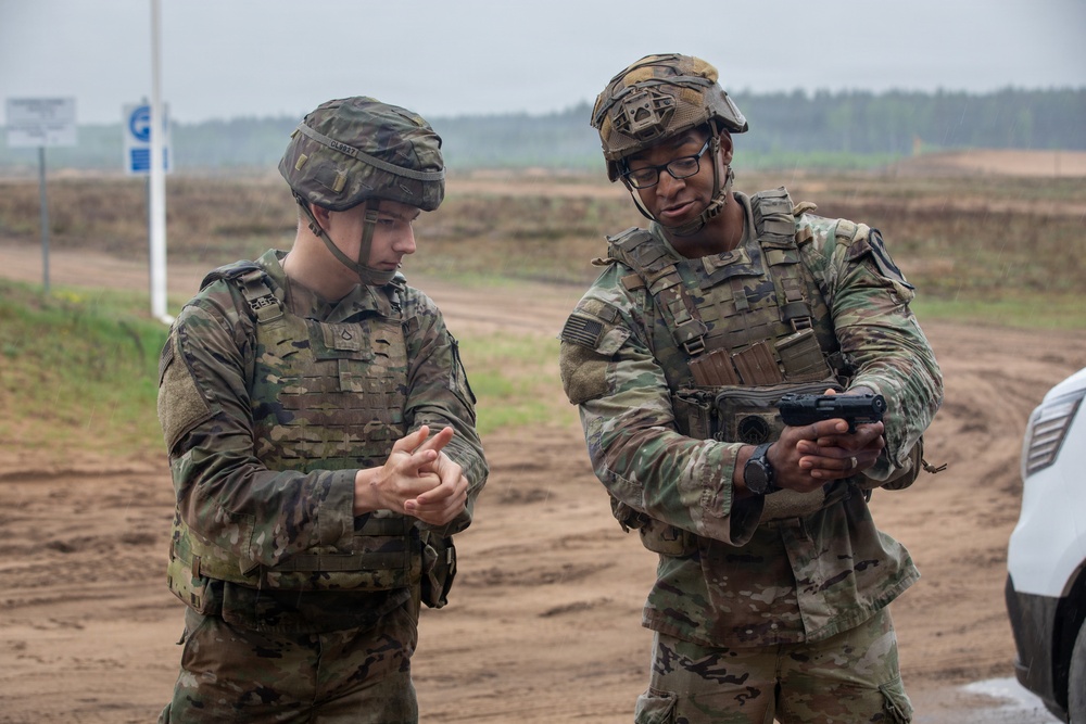 U.S. Army Soldiers conduct pistol marksmanship training alongside NATO partners at Pabradė Training Area, Lithuania