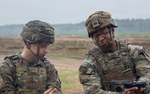 U.S. Army Soldiers conduct pistol marksmanship training alongside NATO partners at Pabradė Training Area, Lithuania
