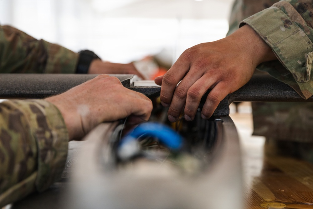 2d Cavalry Regiment Soldiers prepare one-way attack drone for flight operations