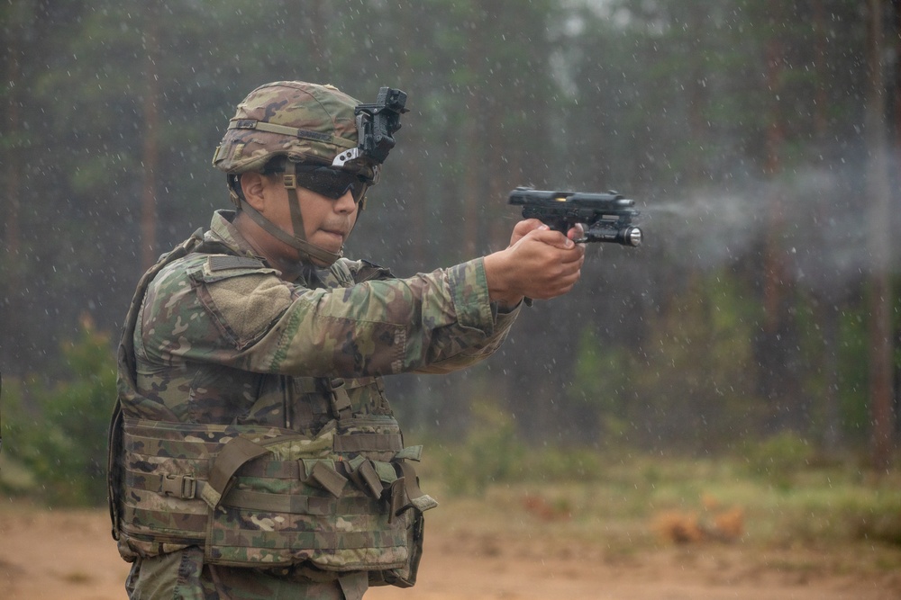 U.S. Army Soldiers conduct pistol marksmanship training alongside NATO partners at Pabradė Training Area, Lithuania