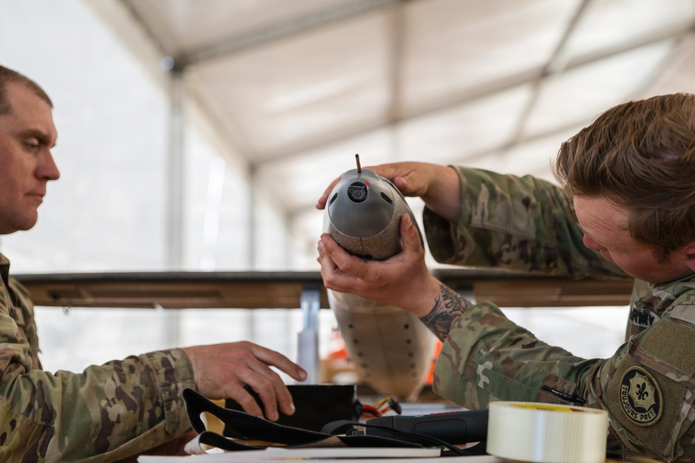 2d Cavalry Regiment Soldiers prepare one-way attack drone for flight operations