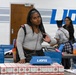U.S. Army Tank-automotive and Armaments Command and Detroit Arsenal Soldiers join Detroit Lions Academy students to pack care kits for deployed Soldiers