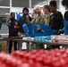U.S. Army Tank-automotive and Armaments Command and Detroit Arsenal Soldiers join Detroit Lions Academy students to pack care kits for deployed Soldiers