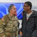 U.S. Army Tank-automotive and Armaments Command and Detroit Arsenal Soldiers join Detroit Lions Academy students to pack care kits for deployed Soldiers