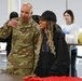 U.S. Army Tank-automotive and Armaments Command and Detroit Arsenal Soldiers join Detroit Lions Academy students to pack care kits for deployed Soldiers