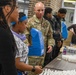 U.S. Army Tank-automotive and Armaments Command and Detroit Arsenal Soldiers join Detroit Lions Academy students to pack care kits for deployed Soldiers