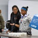 U.S. Army Tank-automotive and Armaments Command and Detroit Arsenal Soldiers join Detroit Lions Academy students to pack care kits for deployed Soldiers