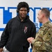 U.S. Army Tank-automotive and Armaments Command and Detroit Arsenal Soldiers join Detroit Lions Academy students to pack care kits for deployed Soldiers