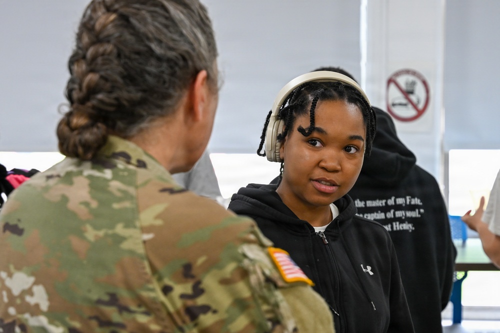 U.S. Army Tank-automotive and Armaments Command and Detroit Arsenal Soldiers join Detroit Lions Academy students to pack care kits for deployed Soldiers