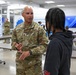U.S. Army Tank-automotive and Armaments Command and Detroit Arsenal Soldiers join Detroit Lions Academy students to pack care kits for deployed Soldiers