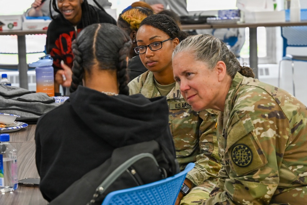 U.S. Army Tank-automotive and Armaments Command and Detroit Arsenal Soldiers join Detroit Lions Academy students to pack care kits for deployed Soldiers