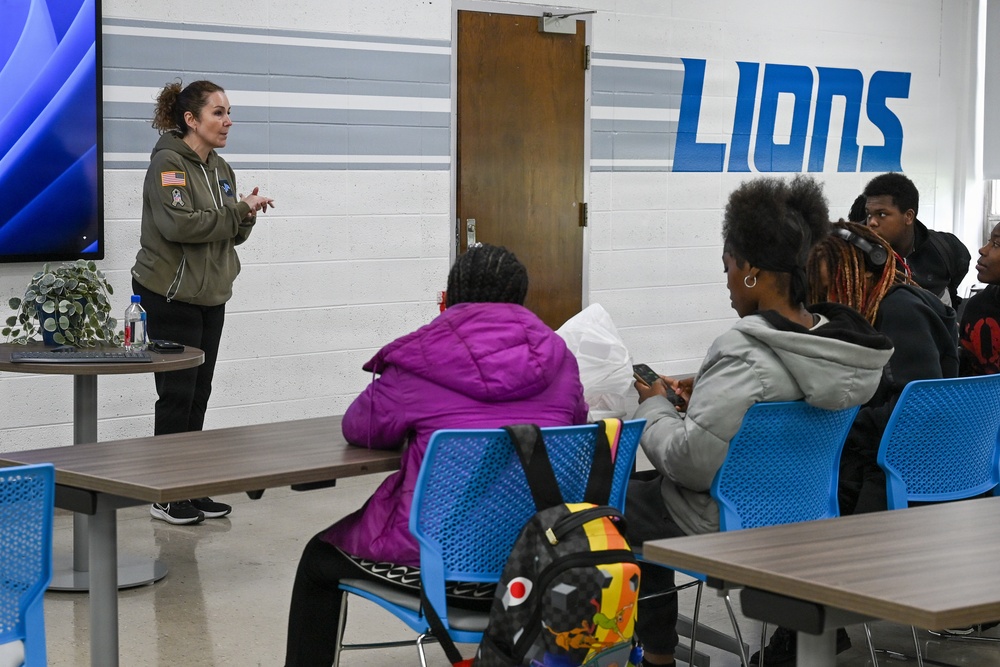 U.S. Army Tank-automotive and Armaments Command and Detroit Arsenal Soldiers join Detroit Lions Academy students to pack care kits for deployed Soldiers