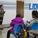 U.S. Army Tank-automotive and Armaments Command and Detroit Arsenal Soldiers join Detroit Lions Academy students to pack care kits for deployed Soldiers