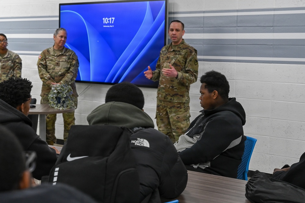 U.S. Army Tank-automotive and Armaments Command and Detroit Arsenal Soldiers join Detroit Lions Academy students to pack care kits for deployed Soldiers