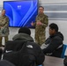 U.S. Army Tank-automotive and Armaments Command and Detroit Arsenal Soldiers join Detroit Lions Academy students to pack care kits for deployed Soldiers