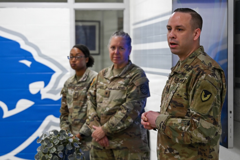 U.S. Army Tank-automotive and Armaments Command and Detroit Arsenal Soldiers join Detroit Lions Academy students to pack care kits for deployed Soldiers