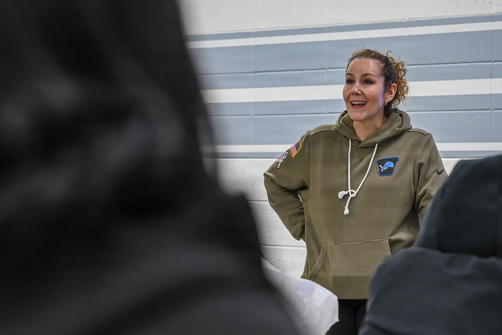 U.S. Army Tank-automotive and Armaments Command and Detroit Arsenal Soldiers join Detroit Lions Academy students to pack care kits for deployed Soldiers