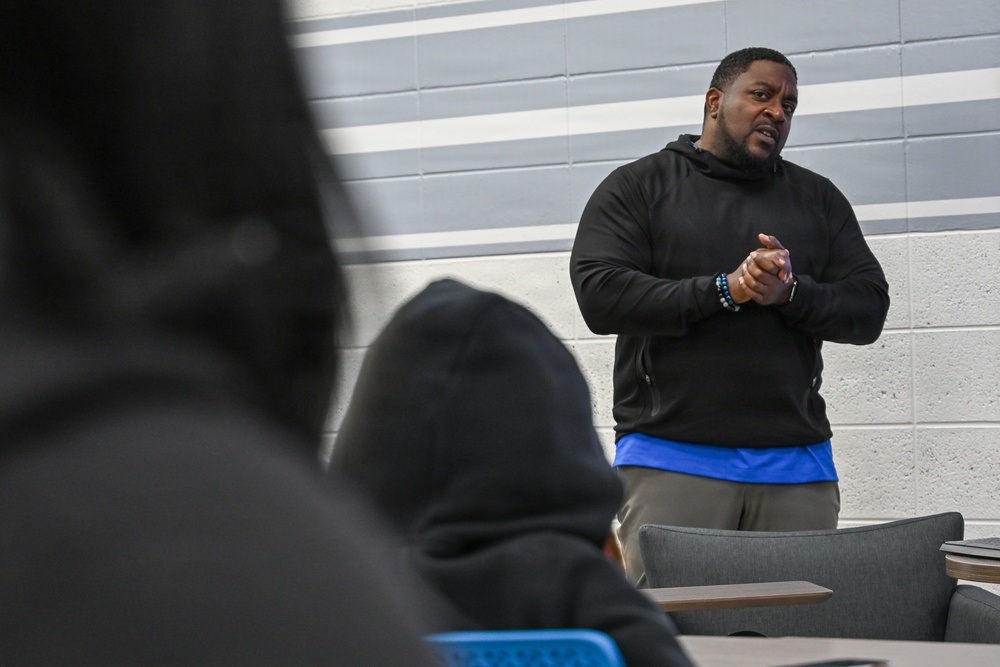 U.S. Army Tank-automotive and Armaments Command and Detroit Arsenal Soldiers join Detroit Lions Academy students to pack care kits for deployed Soldiers