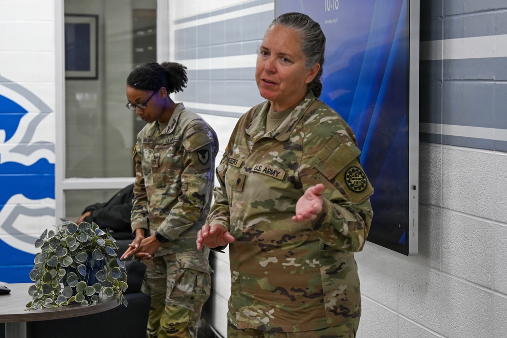 U.S. Army Tank-automotive and Armaments Command and Detroit Arsenal Soldiers join Detroit Lions Academy students to pack care kits for deployed Soldiers