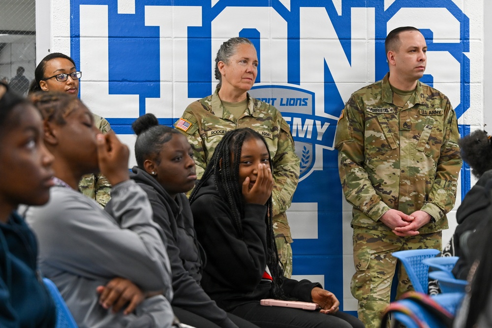 U.S. Army Tank-automotive and Armaments Command and Detroit Arsenal Soldiers join Detroit Lions Academy students to pack care kits for deployed Soldiers