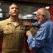 Medal of Honor Recipient pins FMF Warfare Device on MCSFBn Senior Chief