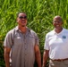Sugarcane farmer with RMA employee