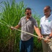 Sugarcane farmer with RMA employee