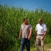 Sugarcane farmer with RMA employee