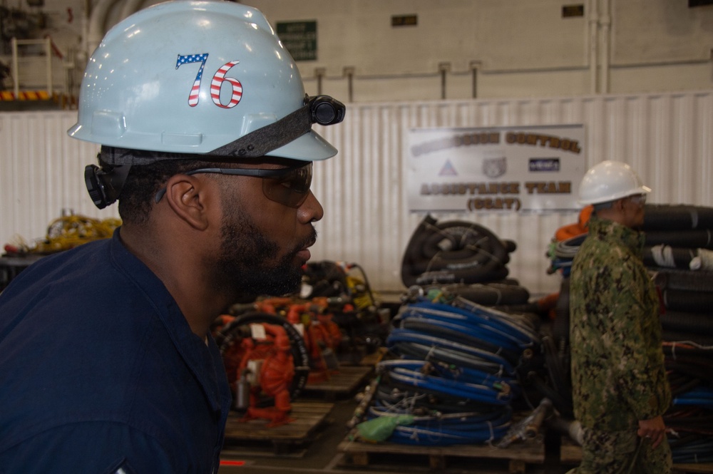 USS Ronald Reagan (CVN 76) Sailors Transport Supplies