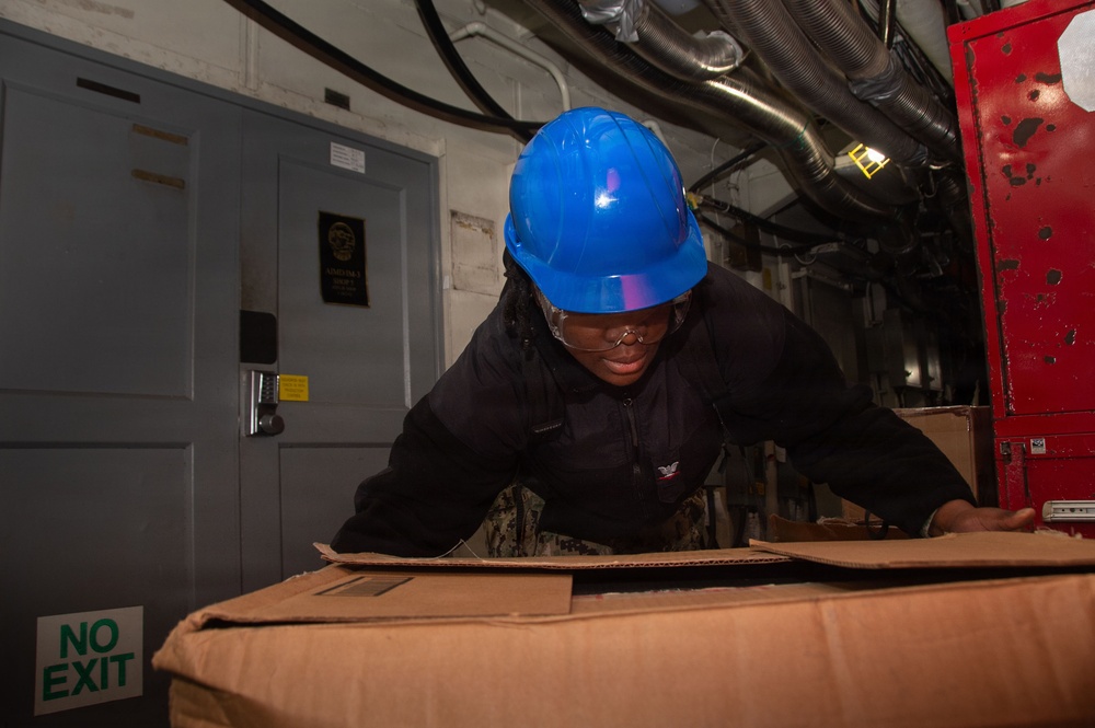 USS Ronald Reagan (CVN 76) Sailors Transport Supplies