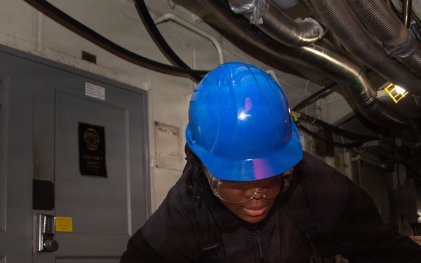 USS Ronald Reagan (CVN 76) Sailors Transport Supplies