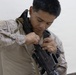U.S. Marines clean and inspect M4 carbines